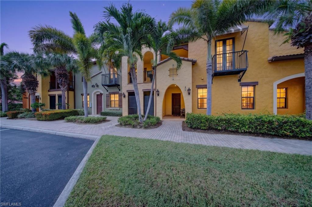 Mediterranean-style exterior featuring a vibrant stucco facade