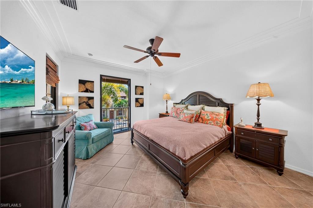 Bedroom featuring tile flooring and a ceiling fan