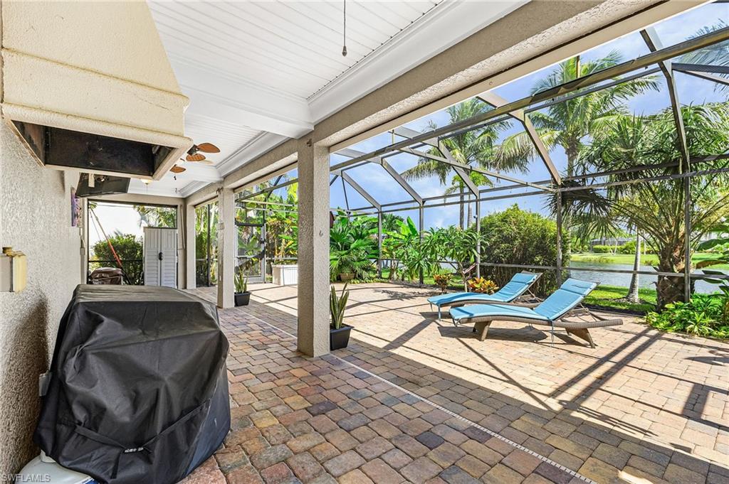 Enjoy your morning coffee or entertaining a group of friends of this lovely screened lanai area.