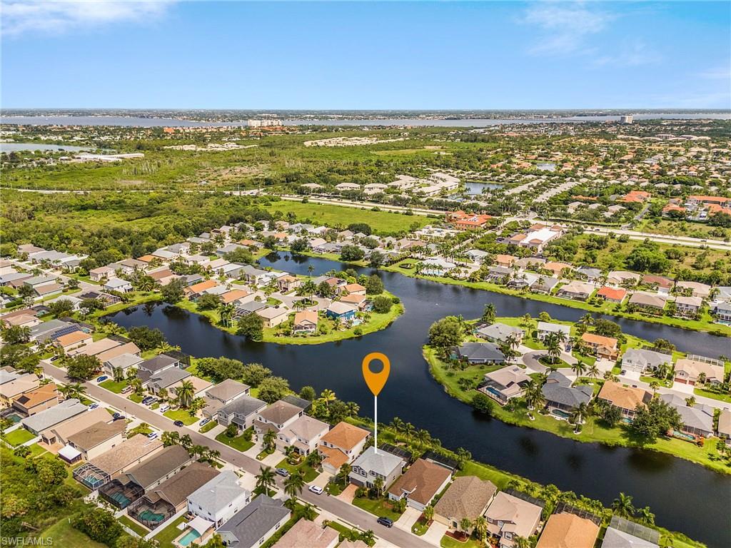 View of the expansive lake behind this Gladiolus Preserve home.