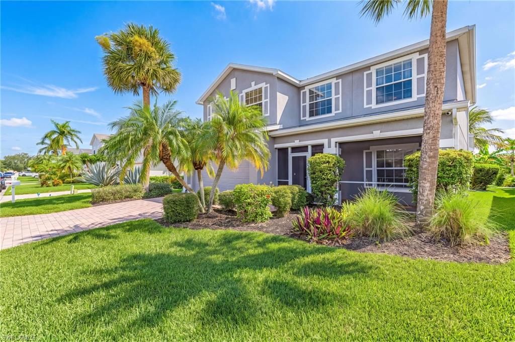 Lush landscaping surround this gem of a home.
