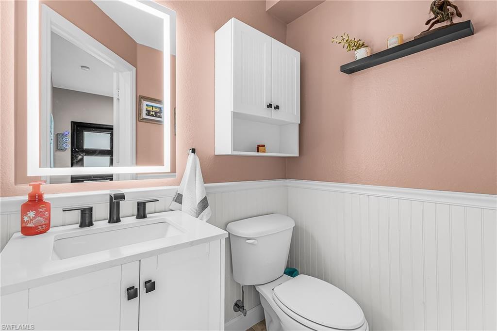 The downstairs half bath has been completely remodeled for a fresh, new feel.