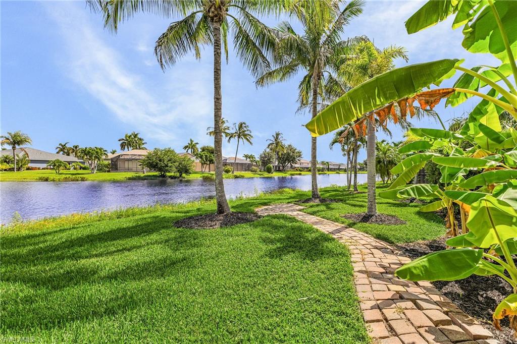 Beautiful lake views and lush landscaping make an awesome focal point for this property
