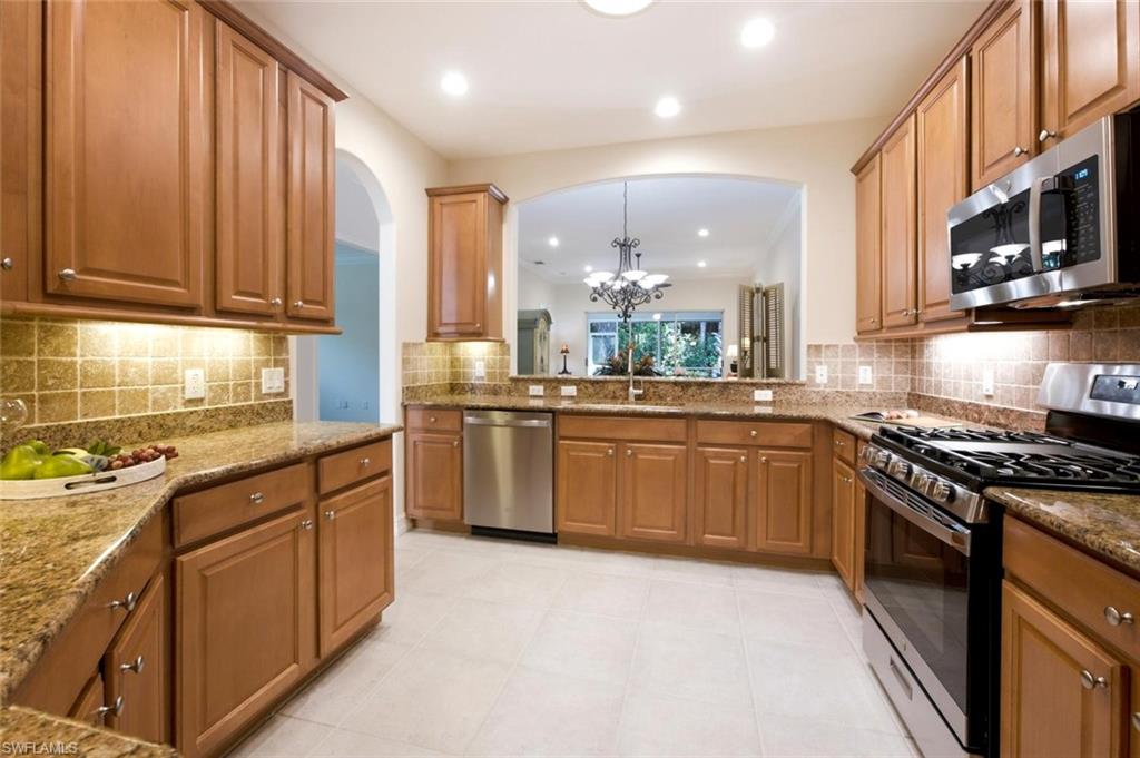 Complete suite of Brand-New Stainless Steel New Appliances with 42" Maple Wood Cabinets