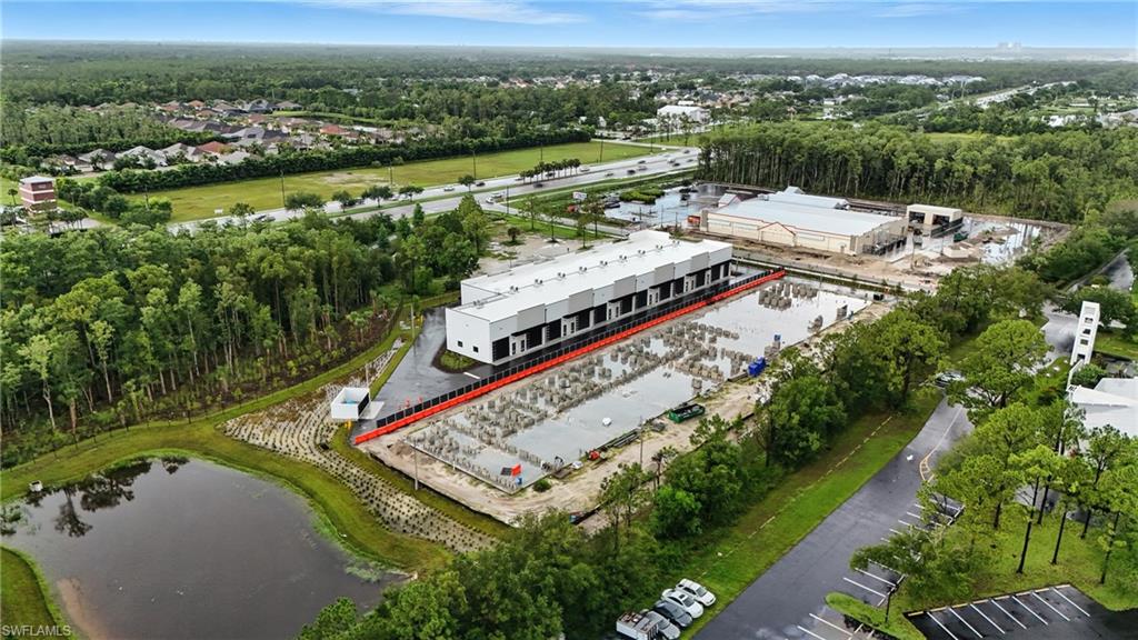 Expansive commercial property featuring multiple structures and significant development
