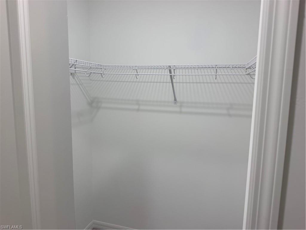 Closet featuring a white wire shelving system