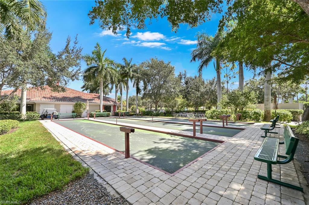 Bocce ball courts featuring paver surrounds and multiple spectator benches