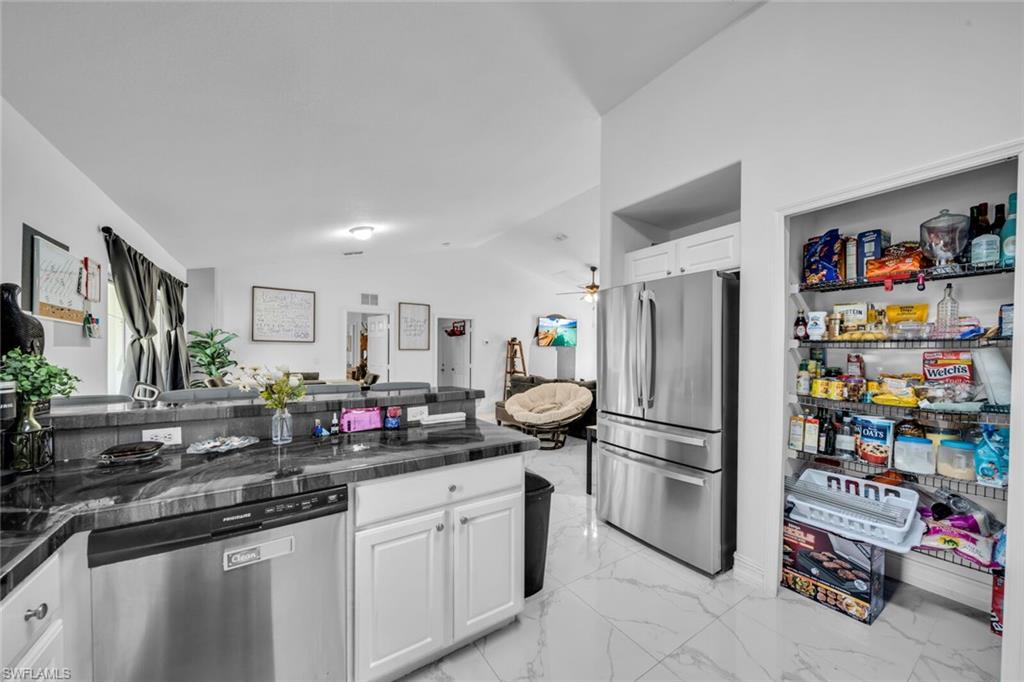 Stainless refrigerator and walk in pantry