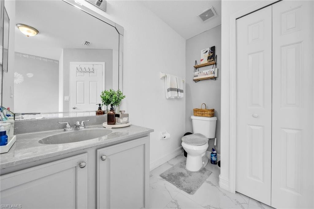 Guest bath vanity and linen closet