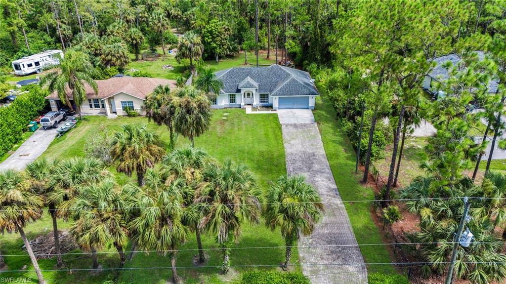 Aerial view of the home and 1.14 acre lot