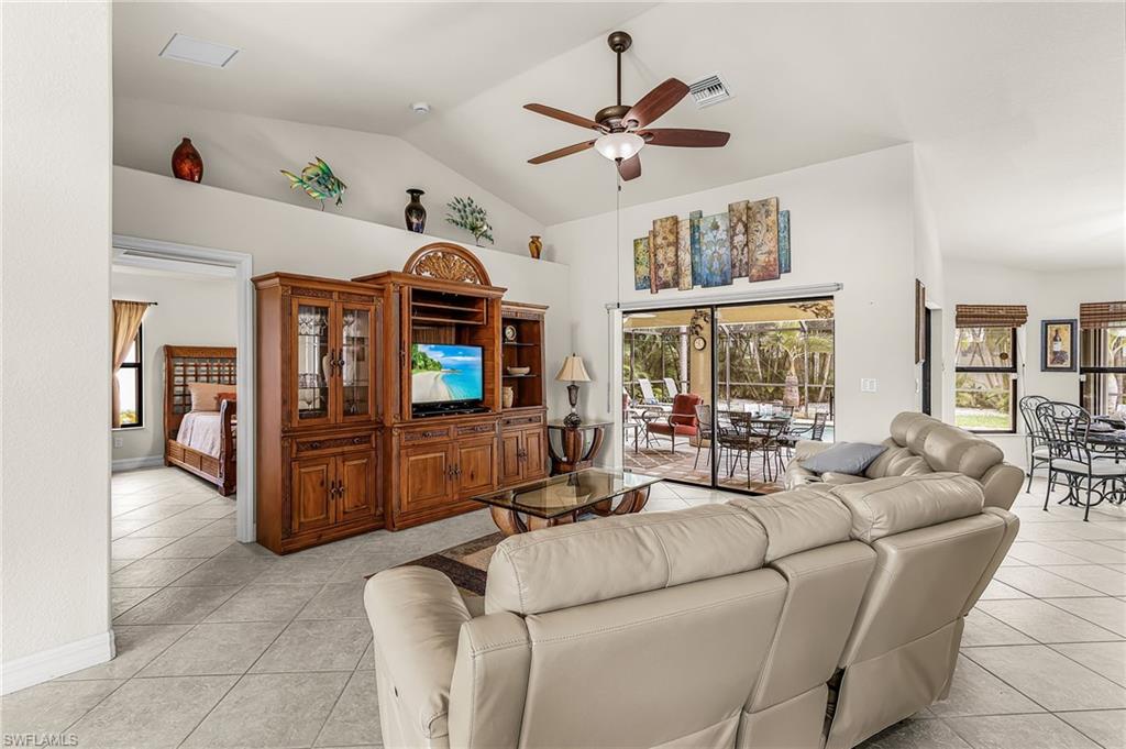 Vaulted ceilings and tile flooring enhance this open living space