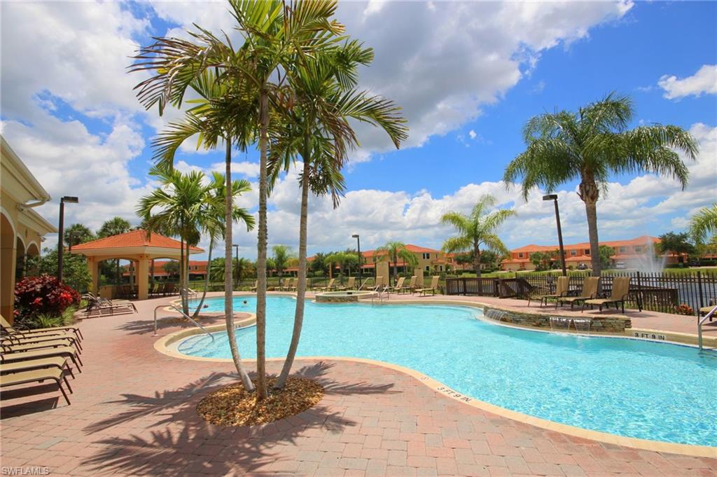 Community pool featuring a gazebo and a patio area