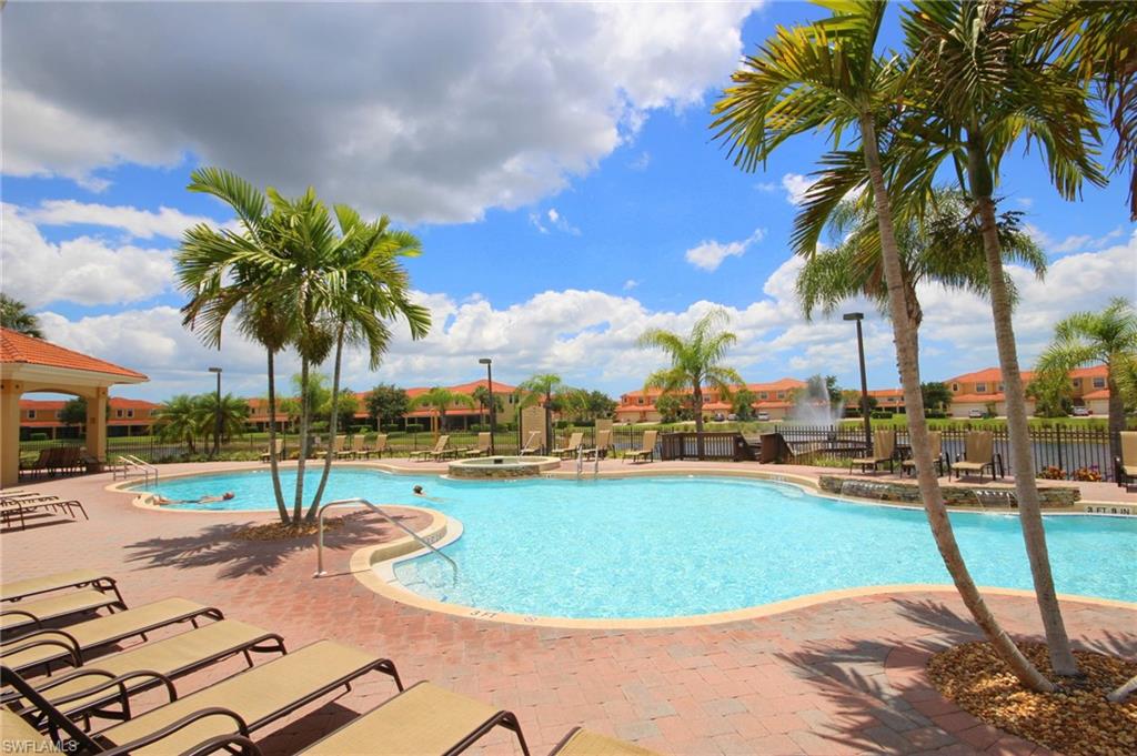 Community pool featuring a patio and a gazebo