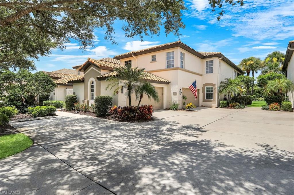 End unit and Impact windows and  electric storm shutters protect this home!