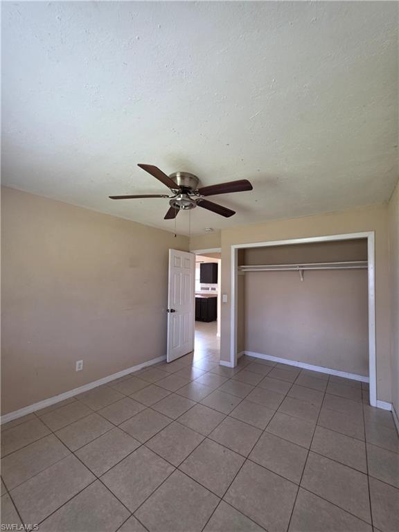 Tiled flooring extending throughout the room