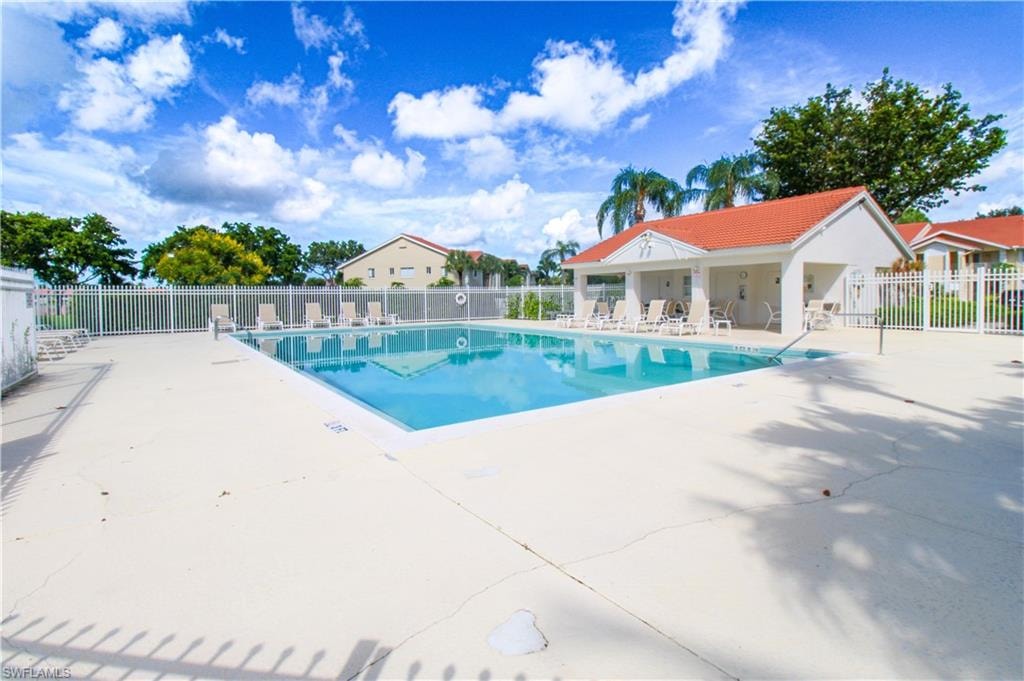 View of swimming pool with a patio