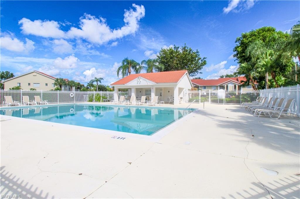 View of swimming pool with a patio area