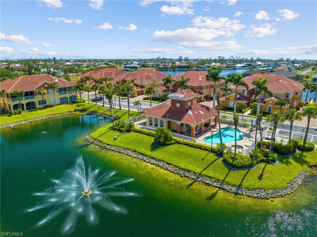 Community Center overlooks lake with water fountain