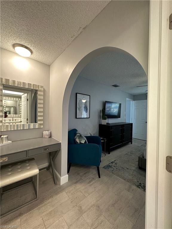 Bathroom with a textured ceiling