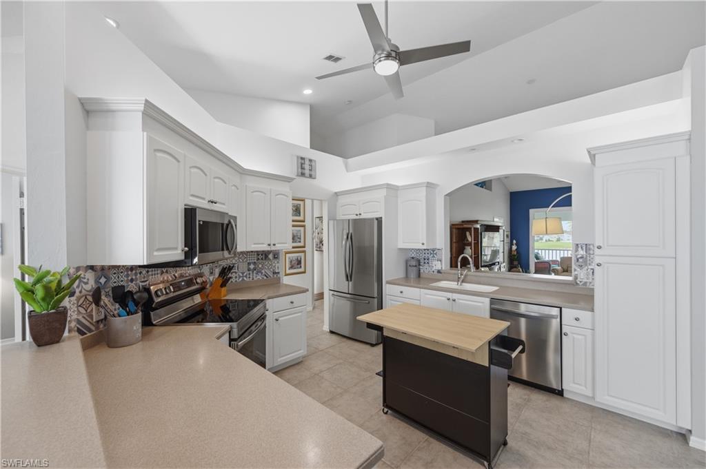 Island Kitchen with pass thru to Dining Area