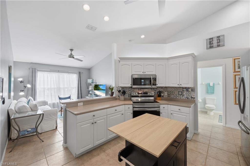 Island Kitchen open to Den Area