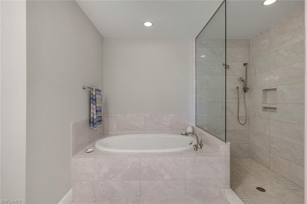 Primary bath soaking tub separate walk in shower