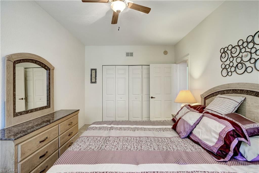 Recessed lighting, ceiling fan, and carpeted flooring