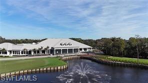 Water view with a golf course