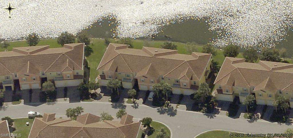 Waterfront townhomes with multi-level architecture and private garages