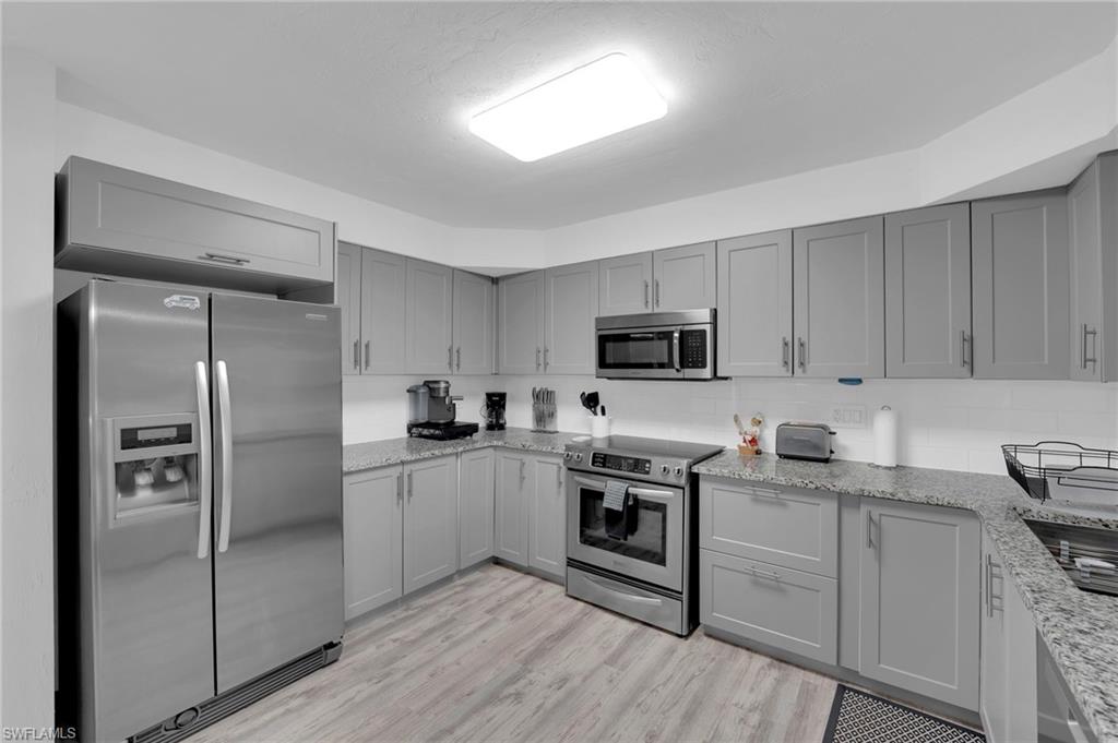 Oversized kitchen with abundant cabinet space