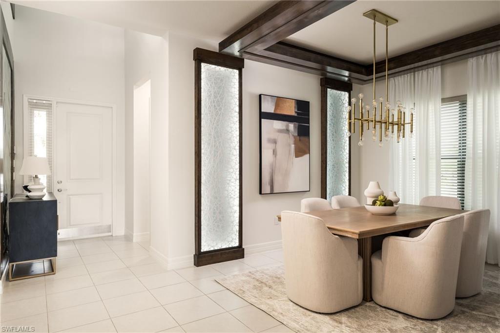 Stunning dining room with a paneled backlight feature and a decorative wall panel