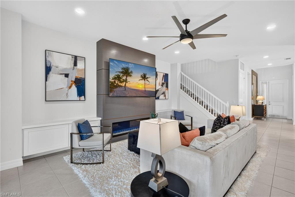 Contemporary living space with a built-in fireplace feature wall