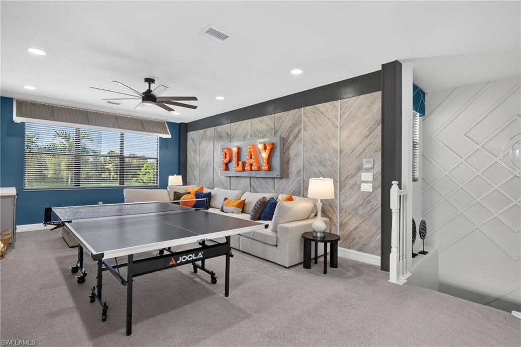Recessed lighting, ceiling fan, and wall-mounted decorative paneling