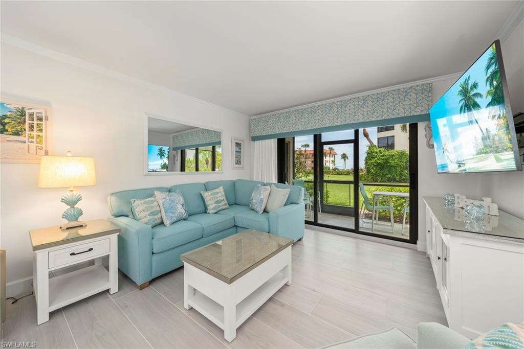 Light wood-finish flooring complements the bright interior