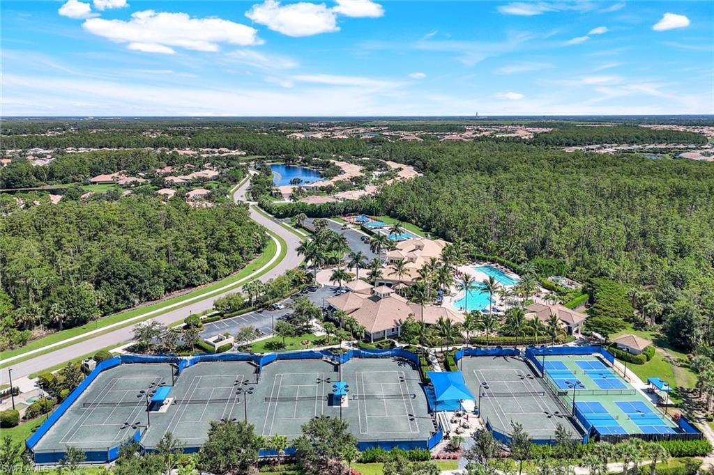 Extensive tennis courts, multiple swimming pools, and a substantial clubhouse