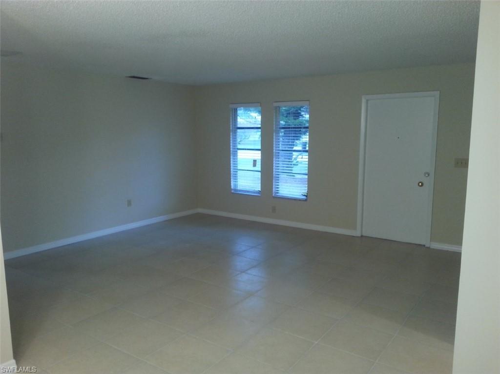 Spare room featuring a textured ceiling