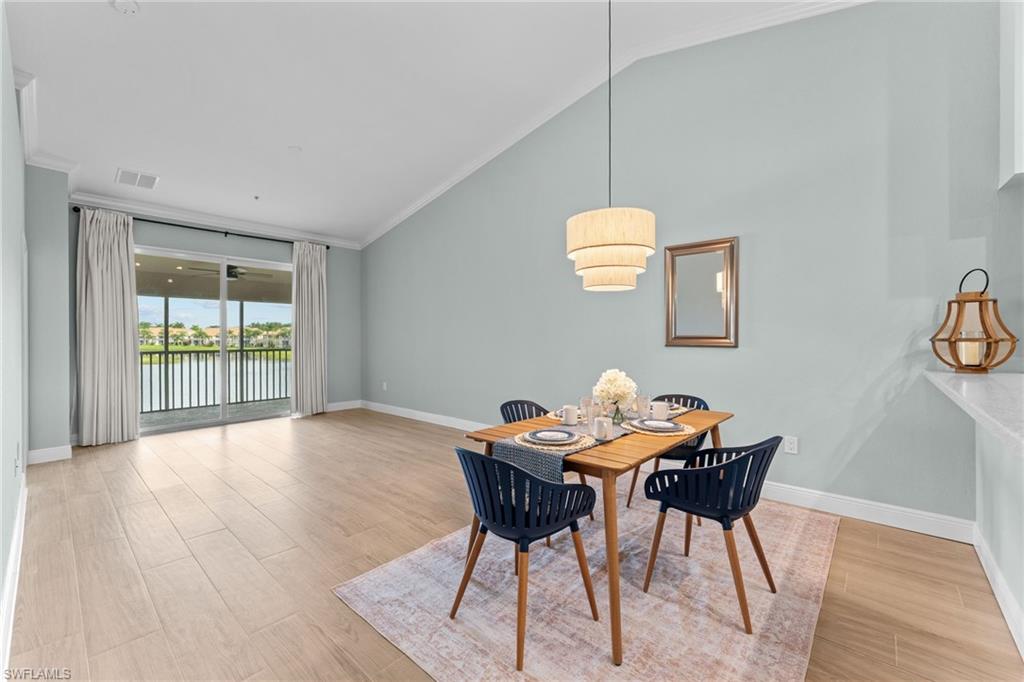 Combo living / dining area with gorgeous water view. West facing - beautiful sunsets.