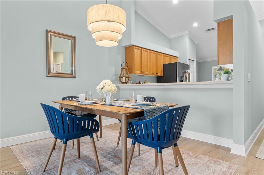 Living /Dining room comination. Breakfast bar counter - could have bar stools for extra seating.