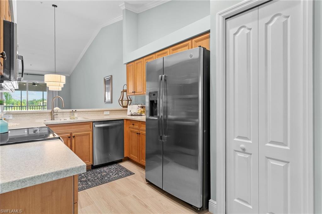 All Stainless appliances. Corian countertop. Tiled floors throughout.