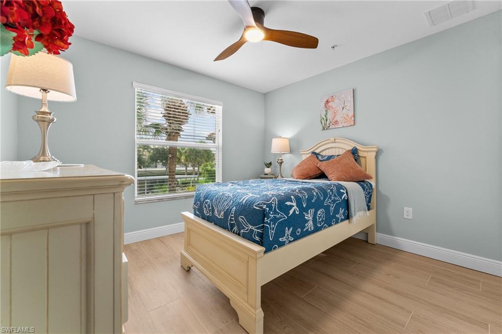 Guest bedroom, large enough for a queen bed - showing 1 twin with night stand and dresser. All new tile floors, baseboards, ceiling fan w/light, professionally painted throughout.