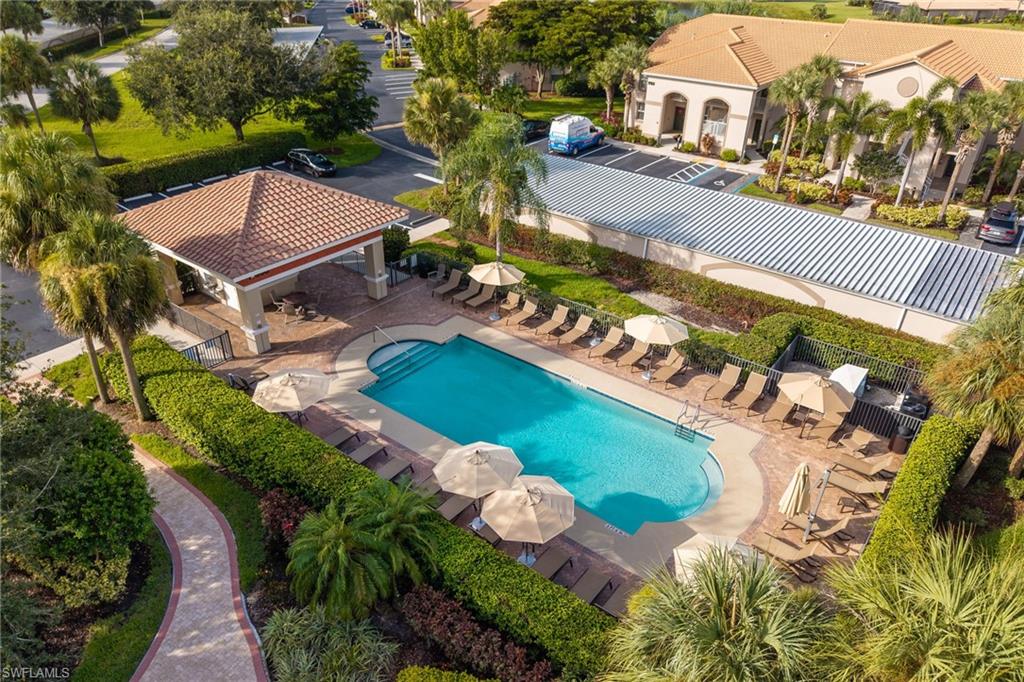 This is the satellite pool just across the parking lot for unit #923! It has abundance of seating, umbrellas, covered space, & picnic area.