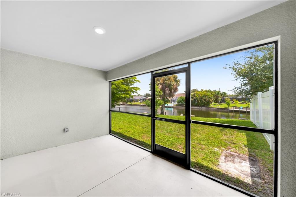 Screened patio featuring a water-facing orientation and direct outdoor access