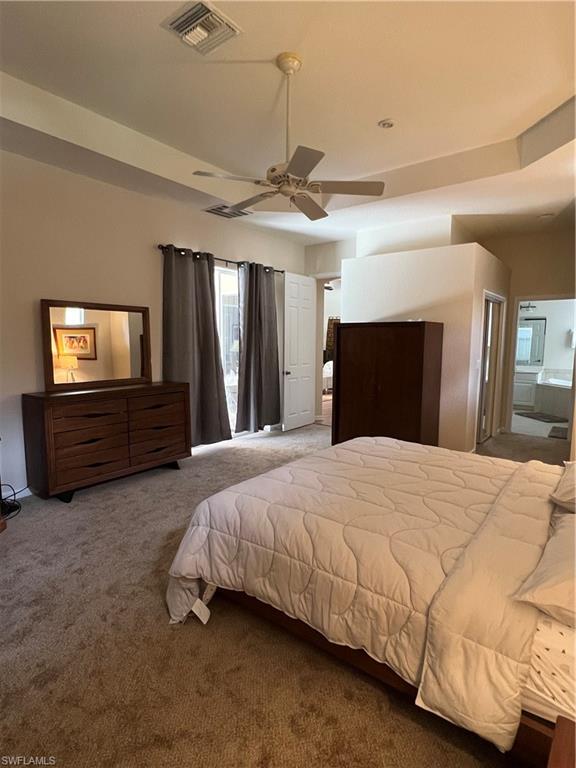 primary Bedroom with sliders to Pool area