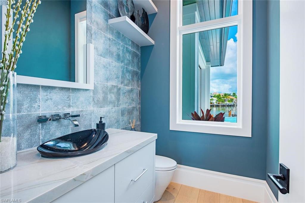 Half bathroom of exterior kitchen