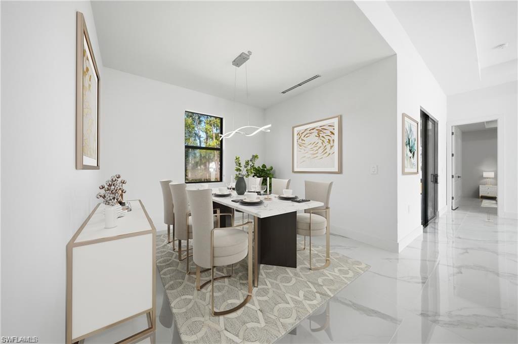 White wall finishes, large window, linear pendant light fixture, and gloss tile flooring