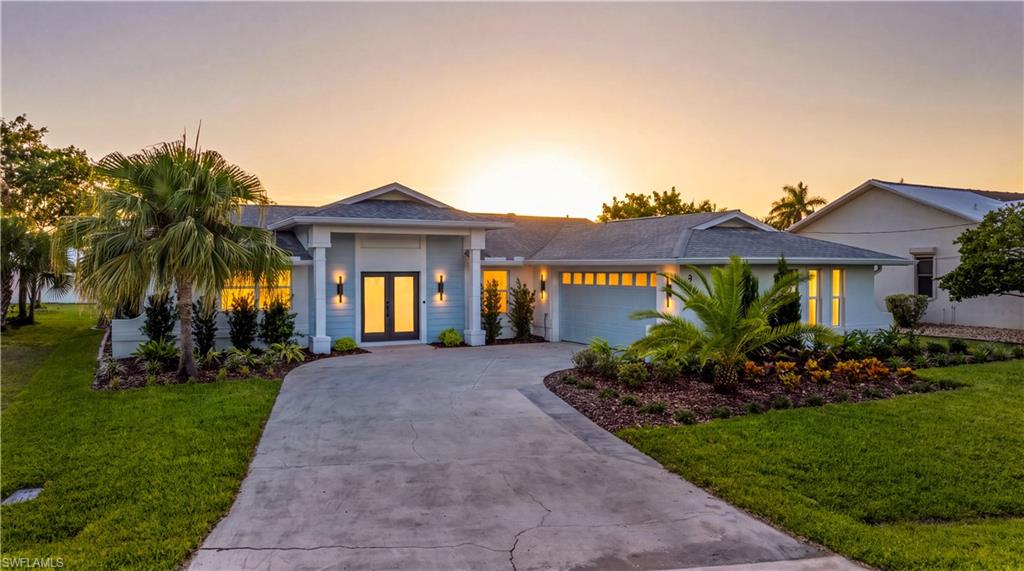 Imagine the sunsets at this updated and upgraded contemporary single-story residence with a concrete driveway and an attached two-car garage