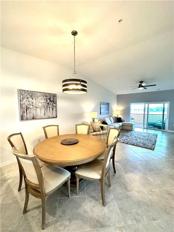Dining area with ceiling fan and tile floors