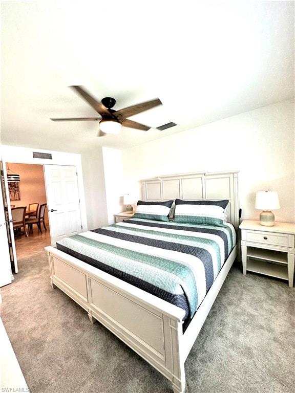 Bedroom featuring carpet and ceiling fan