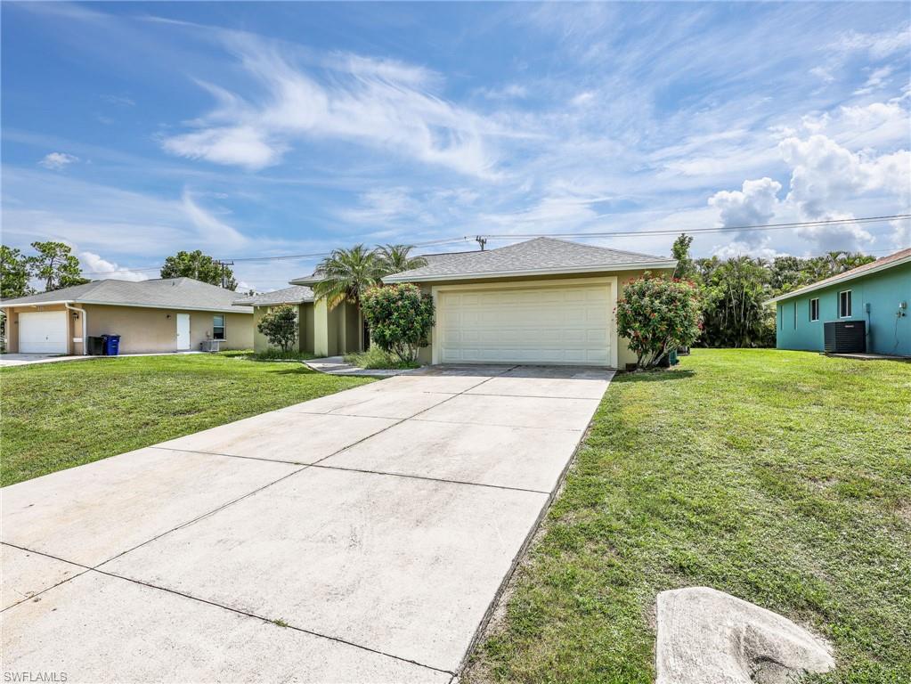 Front Angled View - Long Driveway