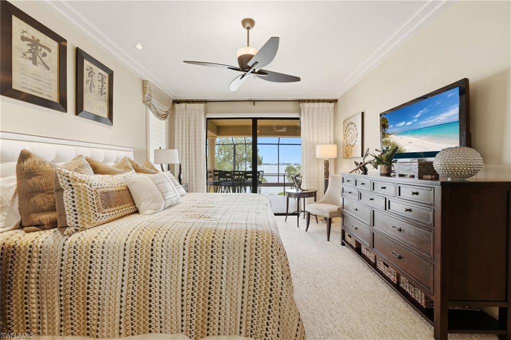 The fifth bedroom, privately located on the second level, offers access to a generous balcony overlooking the river, creating a serene retreat to enjoy breathtaking waterfront views.